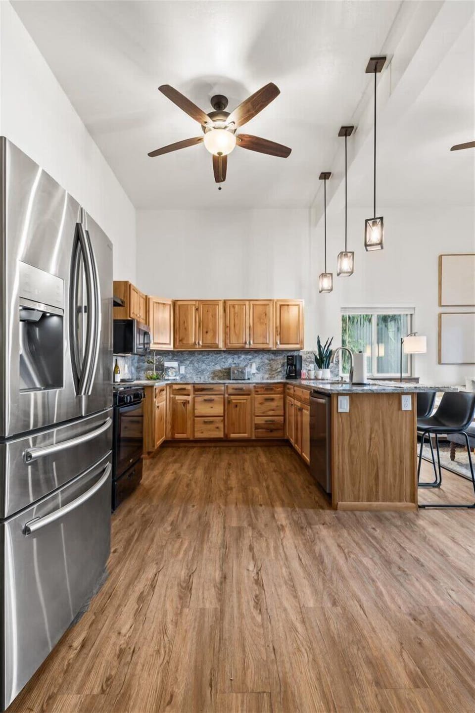 Spacious Kitchen stocked with all the basics.