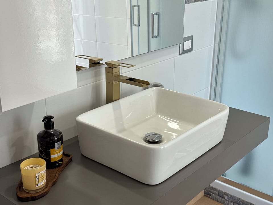 Deluxe Quadruple Room, Housekeeping, City View | Bathroom | Shower, hair dryer, bathrobes, bidet
