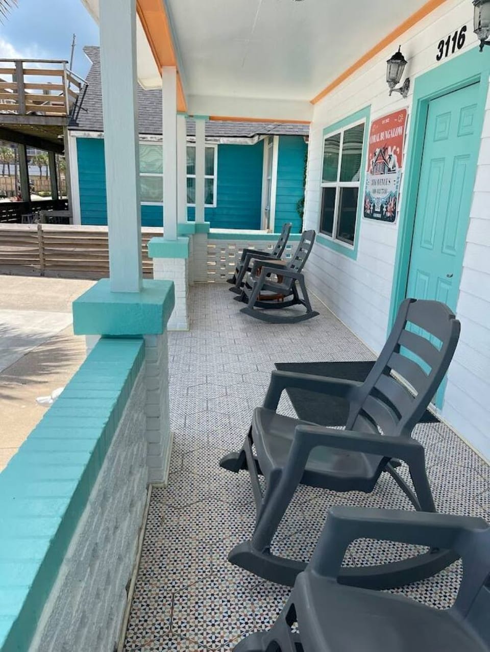 Front porch w/ rocking chairs, take in the breeze with views of the water.