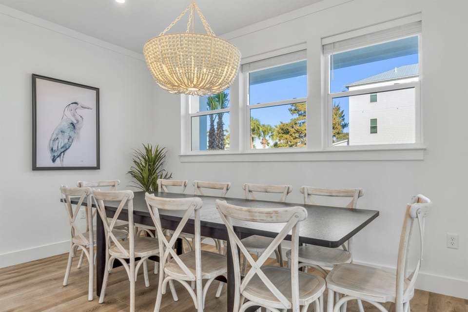 1st Floor - Spacious dining room with seating for 10 plus additional seating for 4 at the kitchen island—ideal for group meals