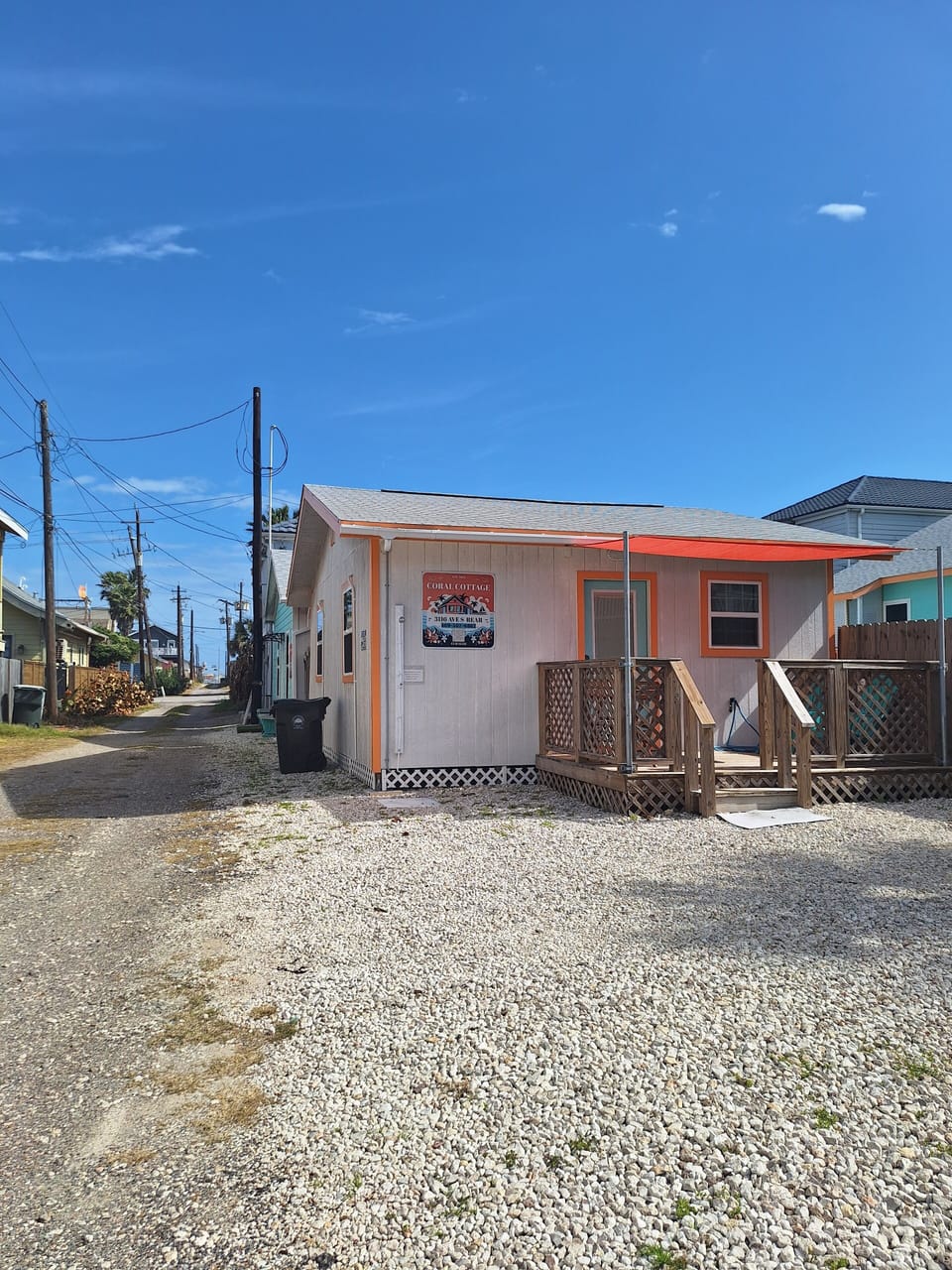 Coral Cottage with signage.