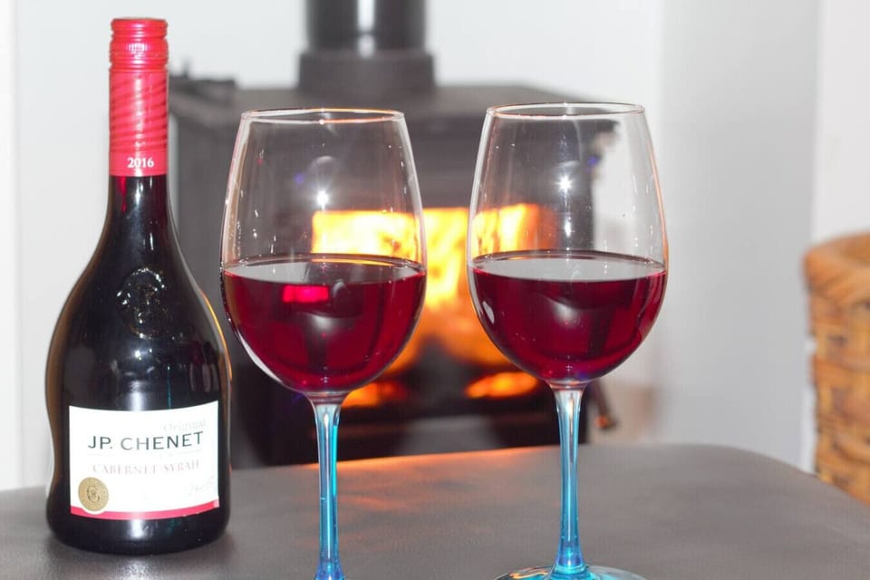 Pour a glass and settle in by the fire for a relaxed evening.