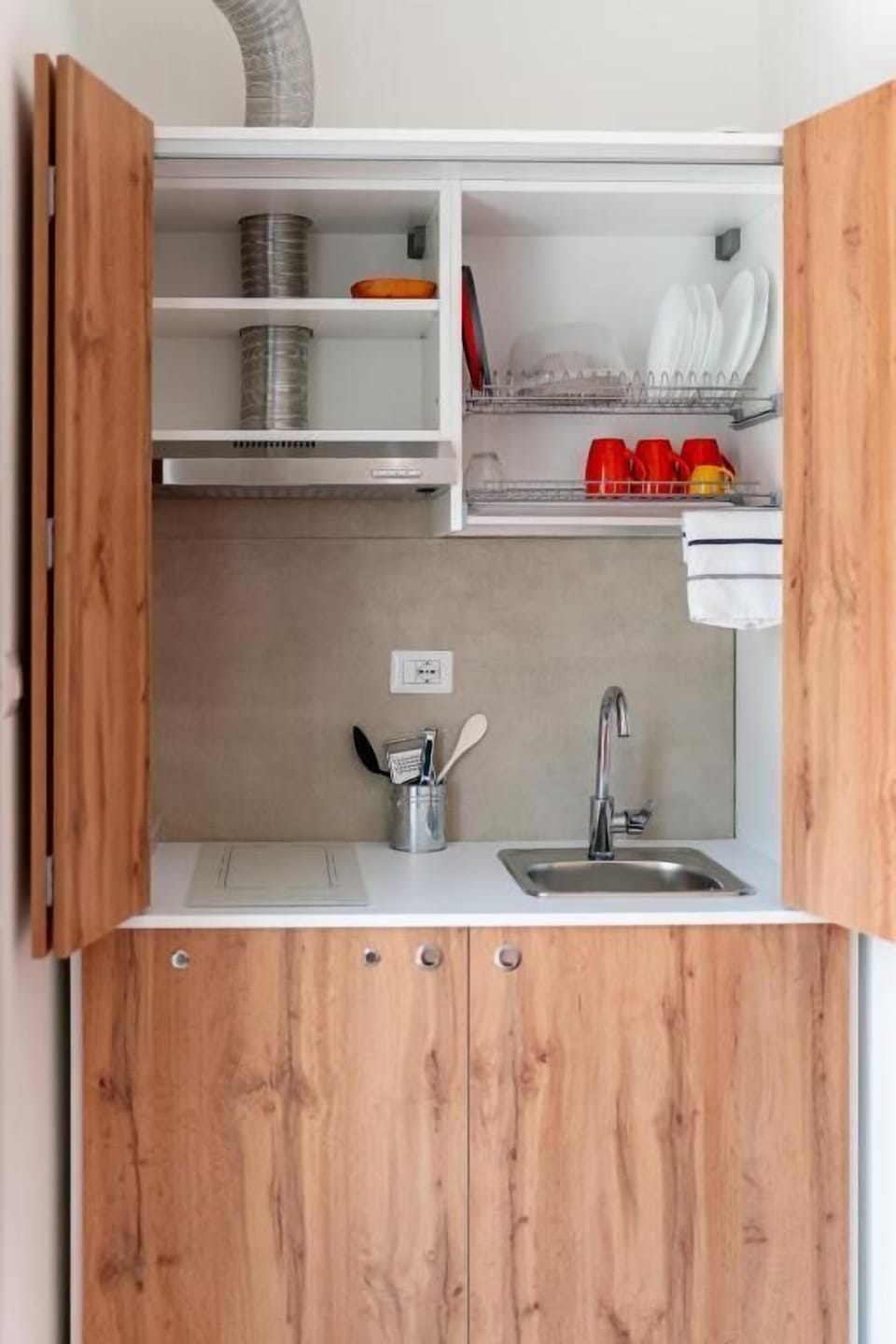 Fridge, cleaning supplies, freezer, dining tables