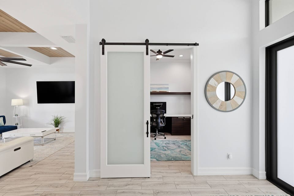 A flex/office space at the front of the home can be used for a variety of functions, based on your groups needs.