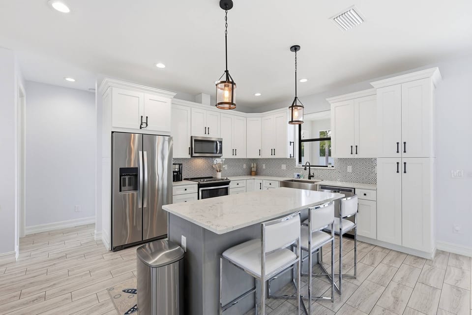 At the heart of the home is a gorgeous, well-appointed kitchen that’s as functional as it is inviting.