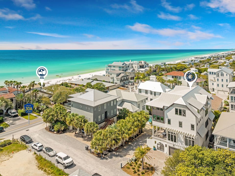 Beachfront paradise awaits with pristine turquoise waters and sugar-white sand just steps away from this stunning coastal retreat.