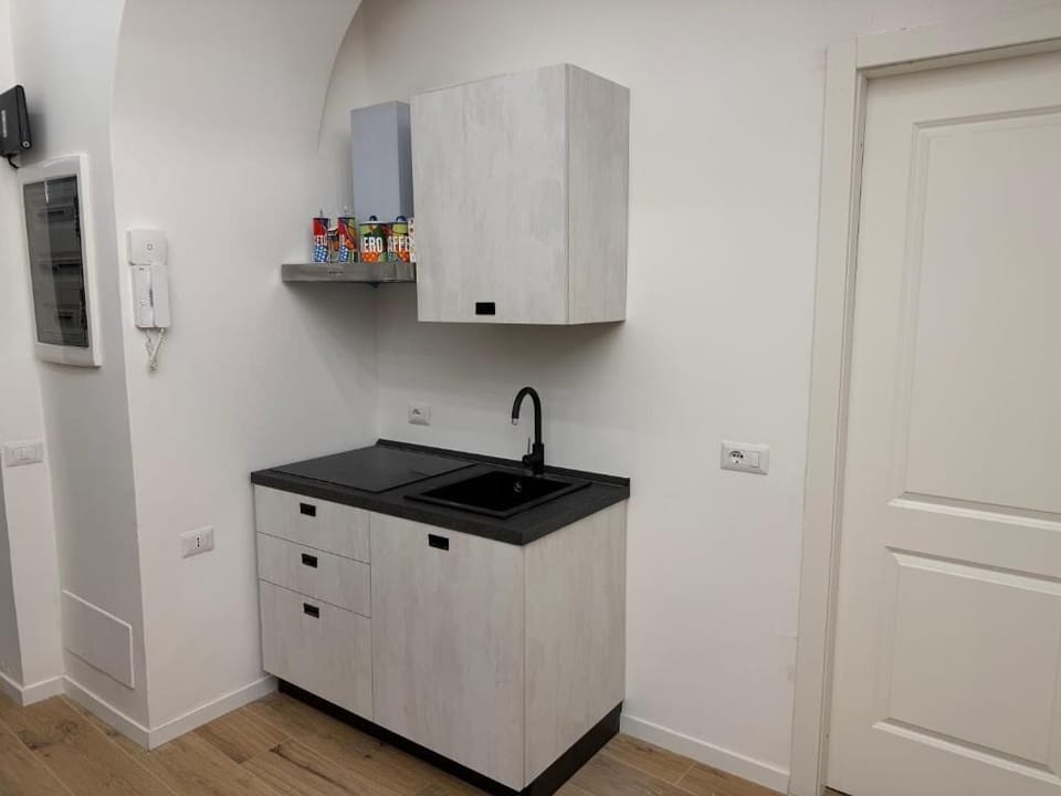 Mini-fridge, microwave, stovetop, espresso maker