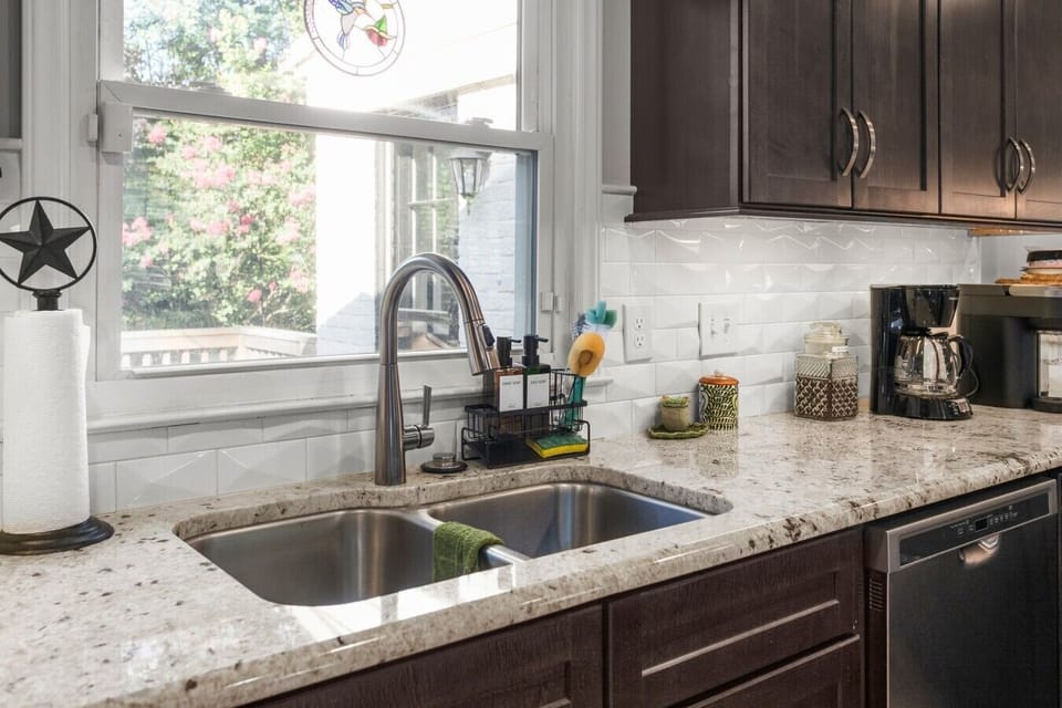 Enjoy views of the back yard from the kitchen sink