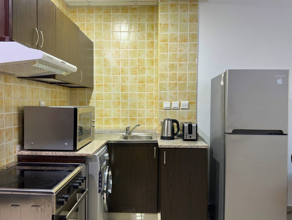 Apartment, 1 Bedroom, Non Smoking, City View | Private kitchen | Coffee/tea maker, full-size fridge, electric kettle