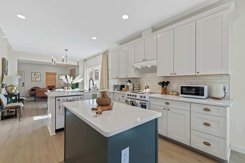 Start your mornings here and end your evenings the same way. A spacious kitchen with plenty of counter space, perfect for cooking, snacking, and connecting.