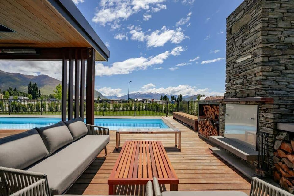Private outdoor seating area with fireplace
