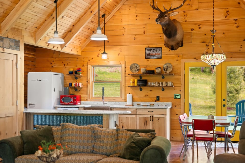 Cozy cabin kitchen with rustic charm and mountain views