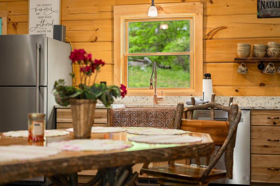 Cozy rustic kitchen with garden views and warm wood accents
