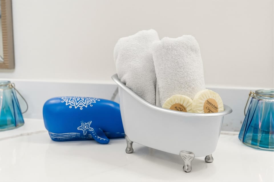 Charming bathroom details with cozy towel display and stylish decor