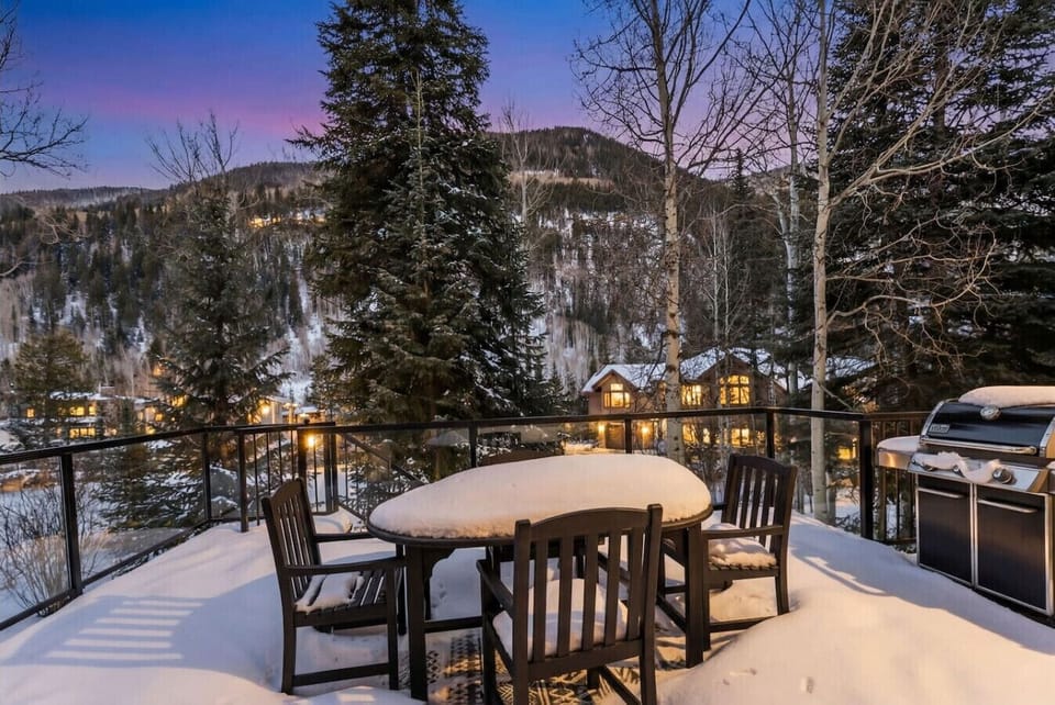 Patio with outdoor dining, BBQ grill, and spectacular views