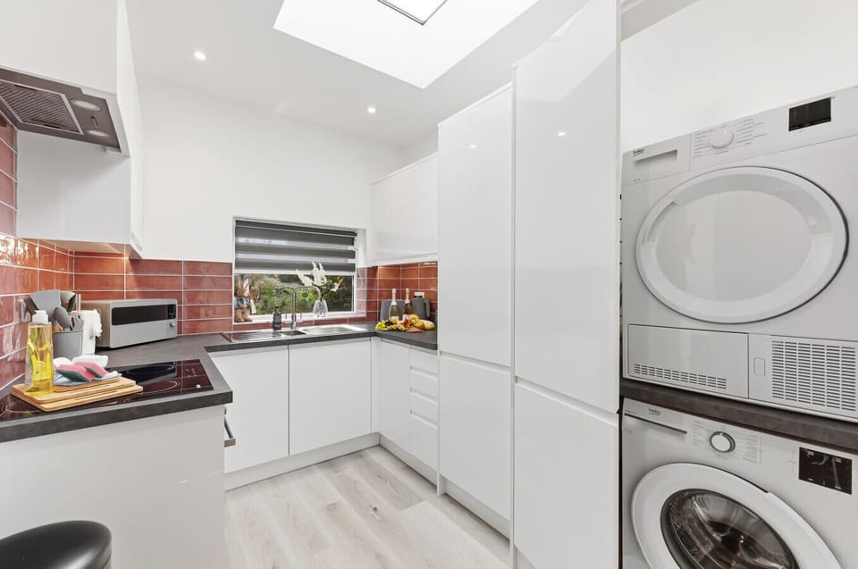 A washing machine and dryer are available for your laundry needs.