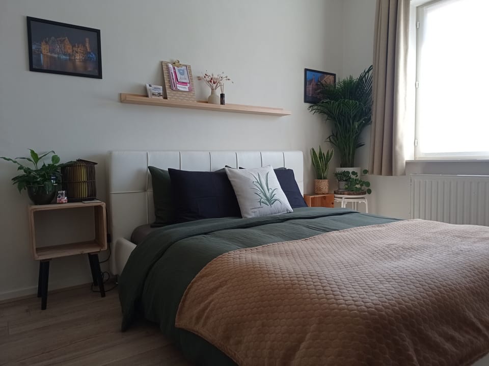Double Room, Garden View | Minibar, blackout drapes, free WiFi, bed sheets