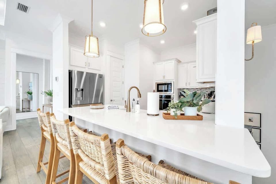 Enjoy meals in the gourmet kitchen & additional island seating for 4.