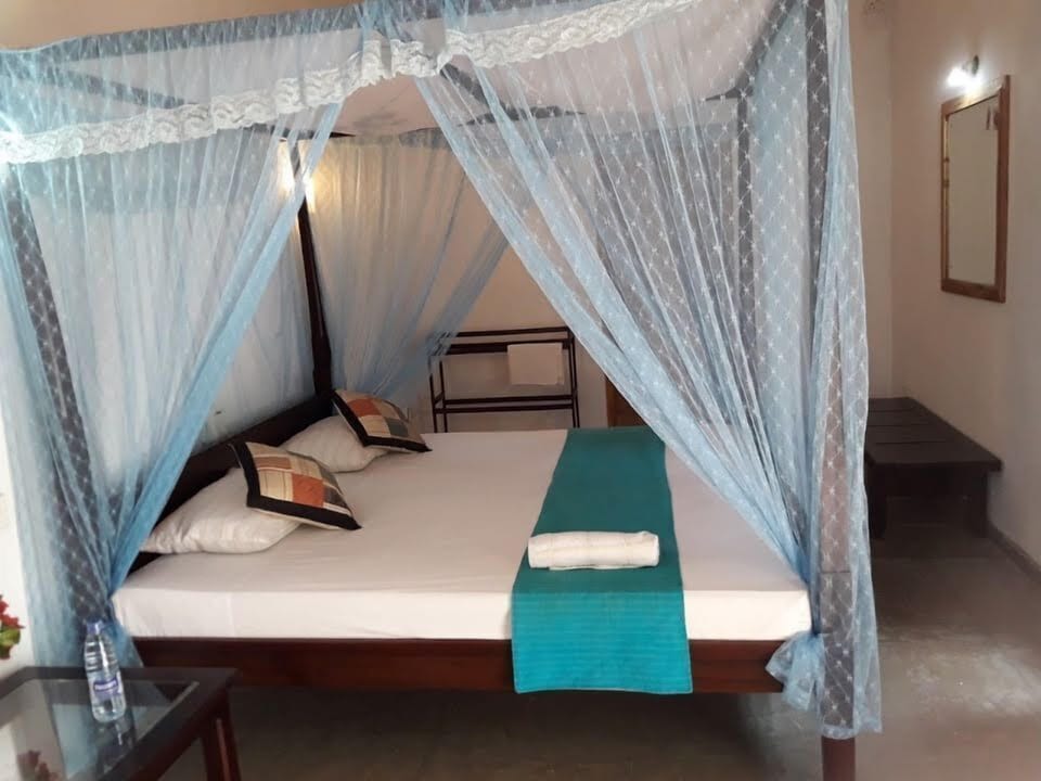 Standard Room, Garden View (With Fan) | In-room safe, desk, soundproofing, iron/ironing board