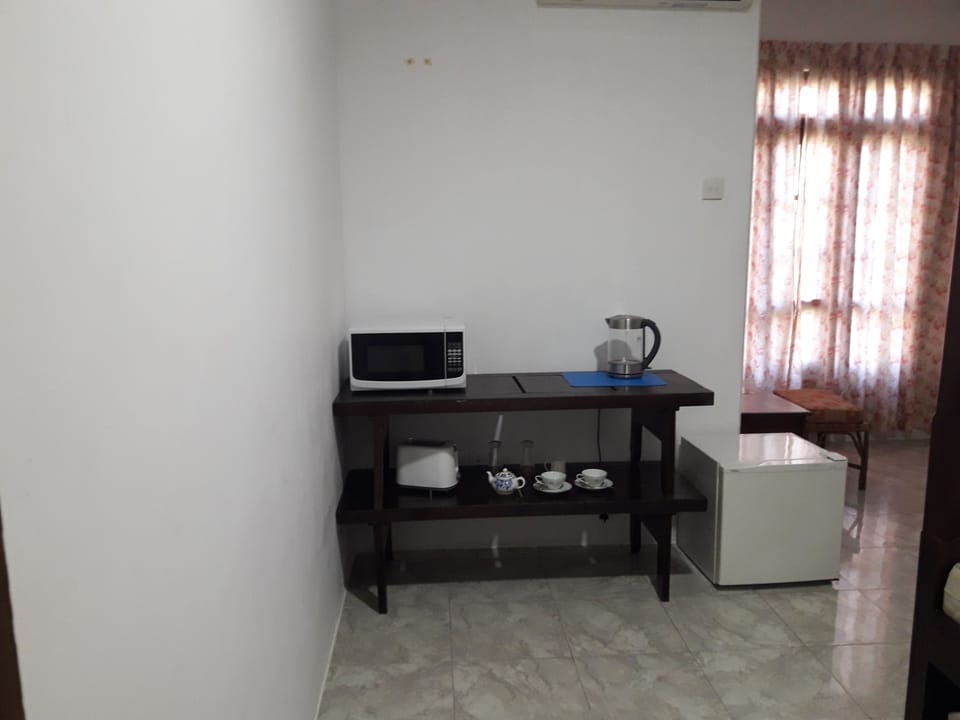 Standard Room, Garden View (With AC) | Private kitchen