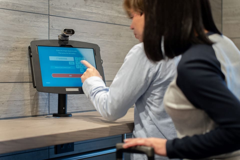 Check-in/check-out kiosk