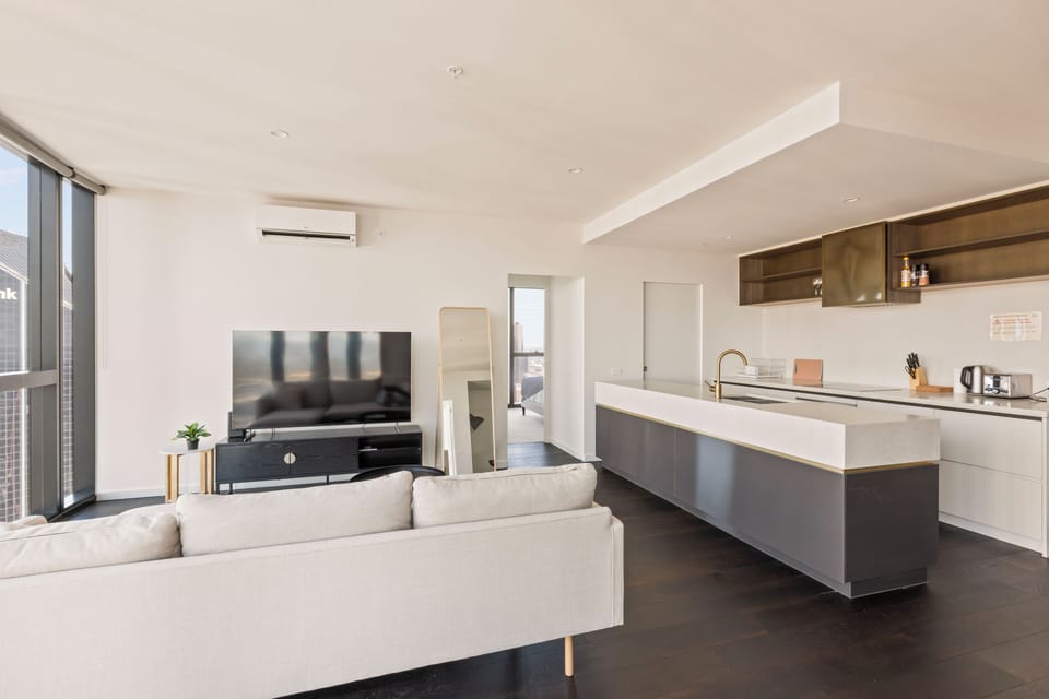 Luxury Apartment, City View | Living area | Flat-screen TV