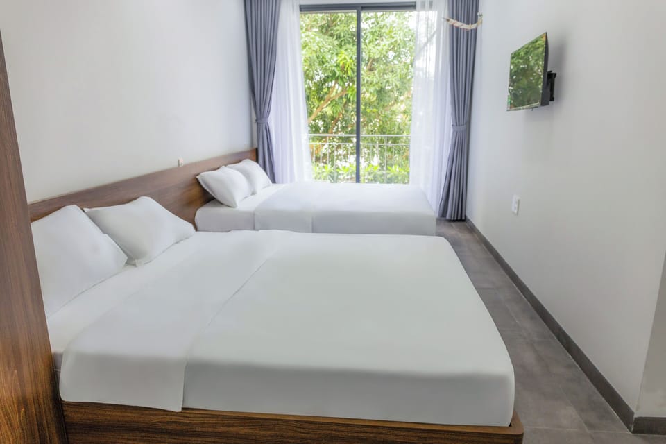 Family Quadruple Room, Balcony | Blackout drapes, iron/ironing board, free WiFi