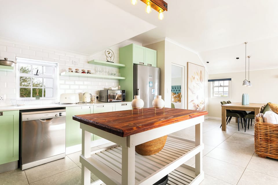 Standard Apartment, 2 Bedrooms, Non Smoking, Partial Ocean View | Private kitchen | Coffee/tea maker
