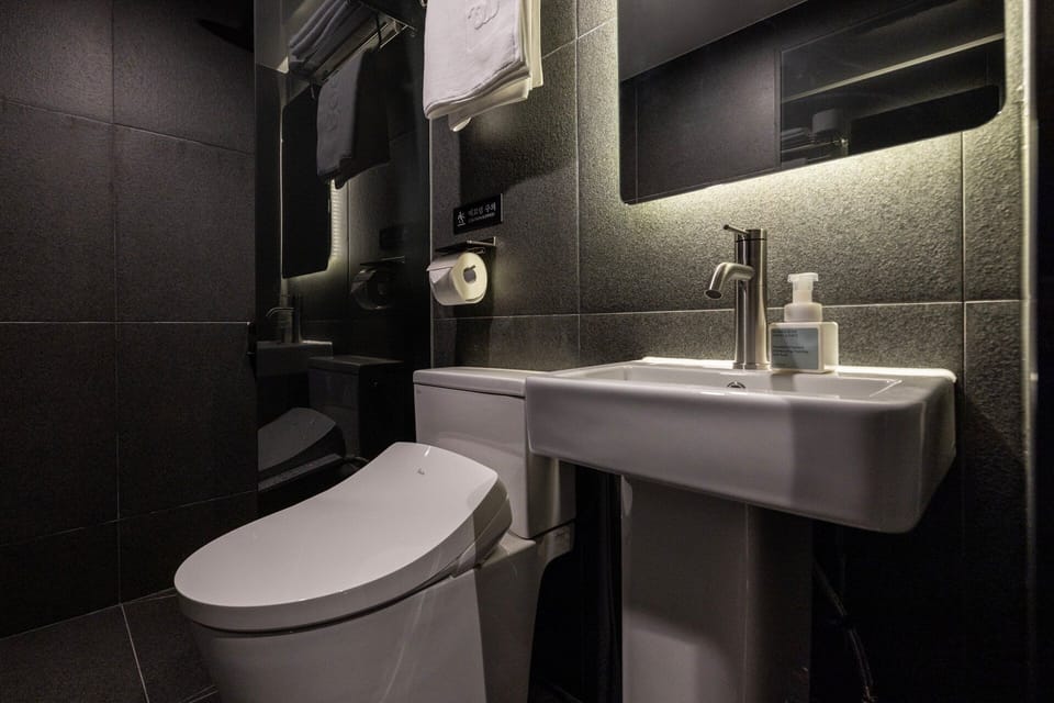 FLOAT | Bathroom | Hair dryer, bathrobes, slippers, bidet