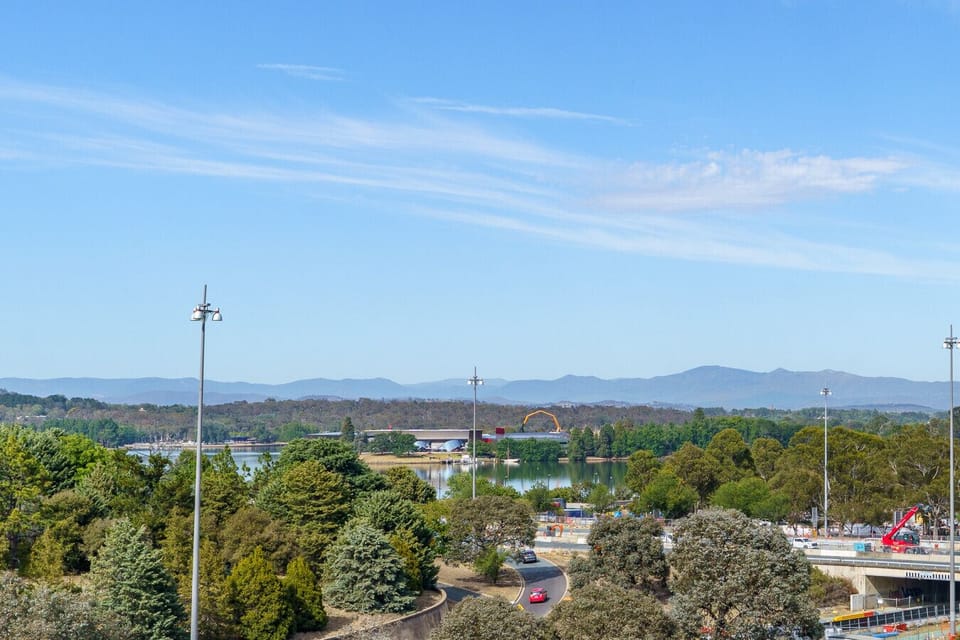 Take in the stunning vistas from your window—lush greenery and peaceful city views create a calming backdrop to your stay.