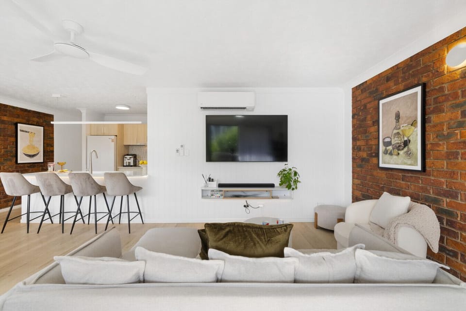 Open plan living space with Smart TV and air-conditioning