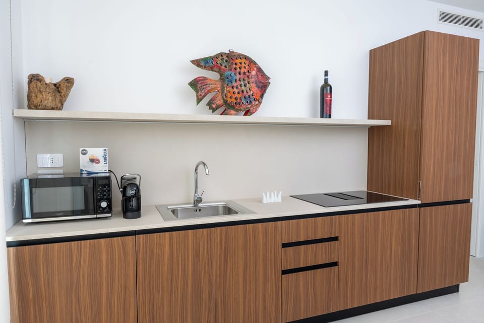 Junior Apartment, 1 Bedroom | Private kitchen | Full-size fridge, microwave, stovetop, dishwasher