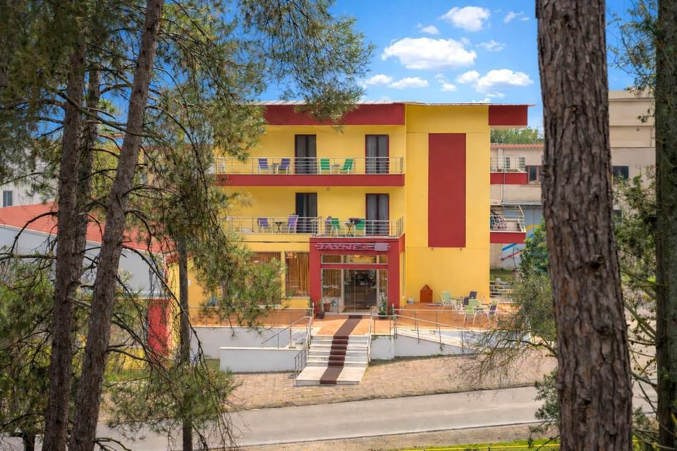 Front view of the building from the street—simple arrival and convenient access.