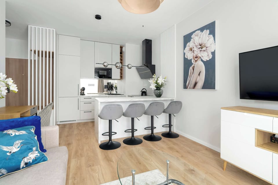 Kitchen island with bar stools, perfect for quick meals or morning coffee.