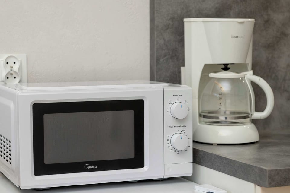 Microwave and coffee maker.