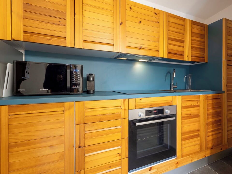 Cabinetry, Wood, Flooring, Furniture, Interior Design, Cupboard, Drawer, Floor, Countertop, Kitchen