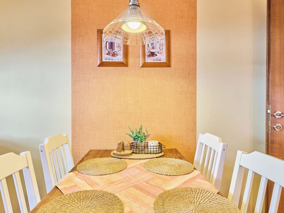 Wall, Interior Design, Wood, Ceiling, Furniture, Yellow, Light Fixture, Lighting, Orange, Room