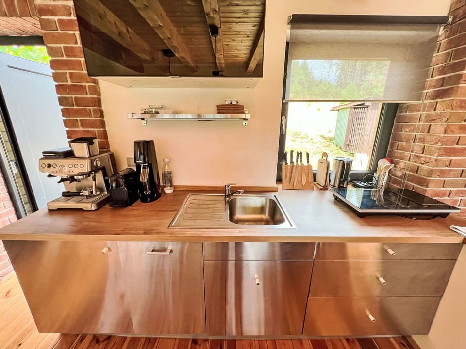 Kitchen, Countertop, Kitchen Appliance, Kitchen Sink, Cabinetry, Plumbing Fixture, Wood Stain, Sink, Home Appliance, Major Appliance