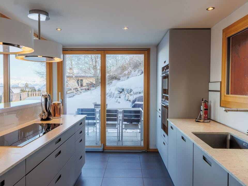 Kitchen, Countertop, Interior Design, Kitchen Appliance, Flooring, Cabinetry, Wood, Furniture, Ceiling, Home Appliance