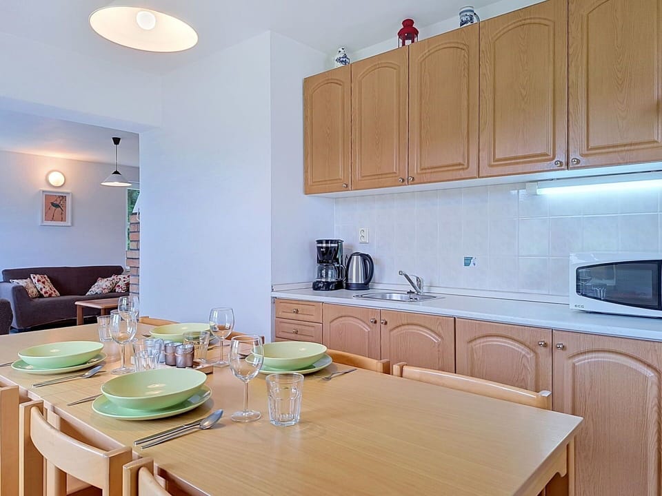 Interior Design, Flooring, Wood, Floor, Ceiling, Kitchen, Furniture, Room, Countertop, Lighting