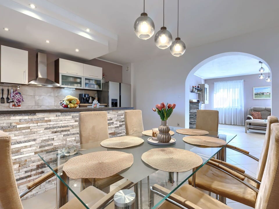Furniture, Interior Design, Flooring, Wall, Light Fixture, Ceiling, Table, Wood, Dining Room, Kitchen & Dining Room Table