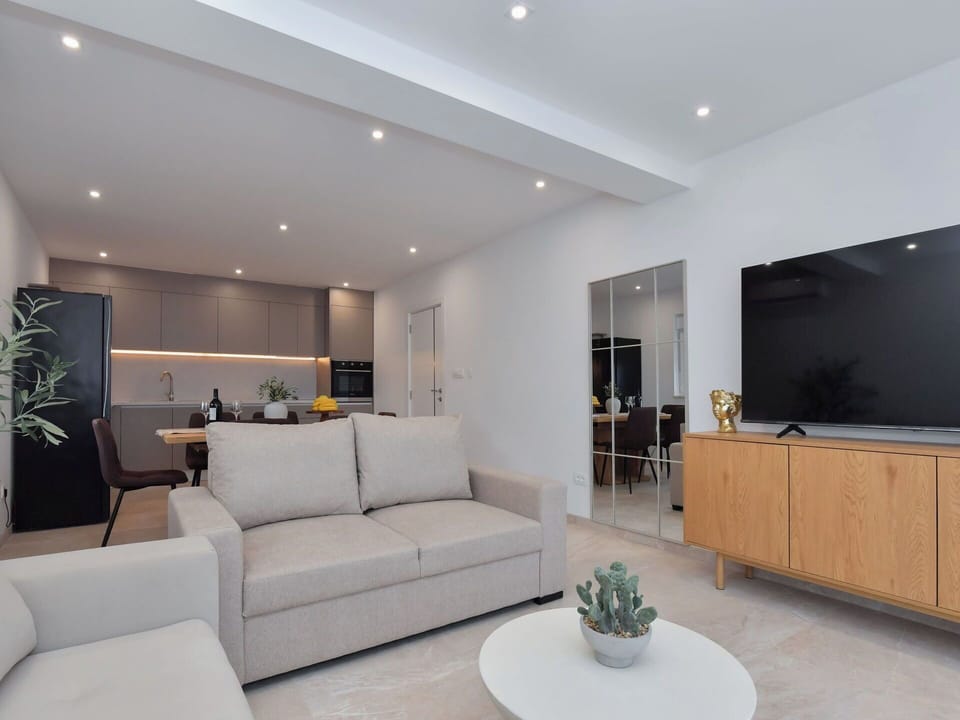 Furniture, Interior Design, Flooring, Couch, Floor, Wall, Wood, Ceiling, Room, Living Room