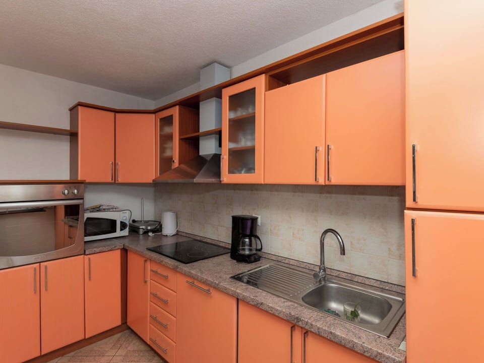 Kitchen, Countertop, Cabinetry, Kitchen Appliance, Major Appliance, Wood, Kitchen Sink, Interior Design, Flooring, Furniture