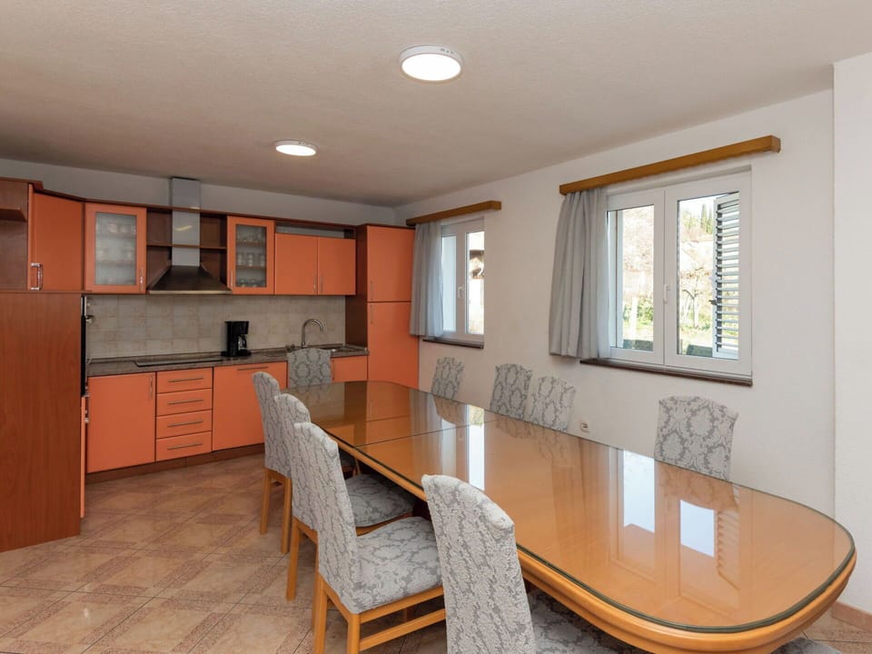 Furniture, Interior Design, Flooring, Wood, Floor, Ceiling, Table, Lighting, Light Fixture, Kitchen & Dining Room Table