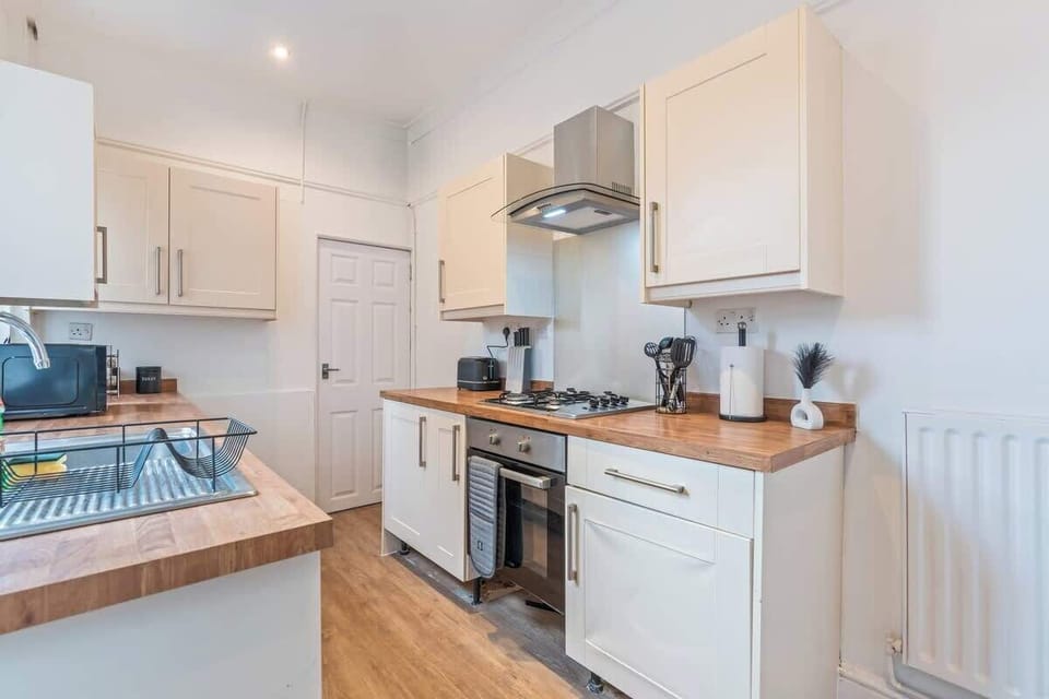 Enjoy the convenience of cooking your own meals with modern appliances and all the essential cookware provided.