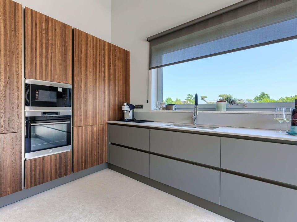 Kitchen, Interior Design, Wood, Kitchen Appliance, Flooring, Cabinetry, Countertop, Lighting, Home Appliance, Home