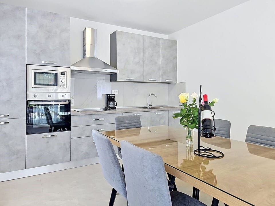 Furniture, Flooring, Interior Design, Floor, Wood, Cabinetry, Chair, Countertop, Kitchen, Ceiling