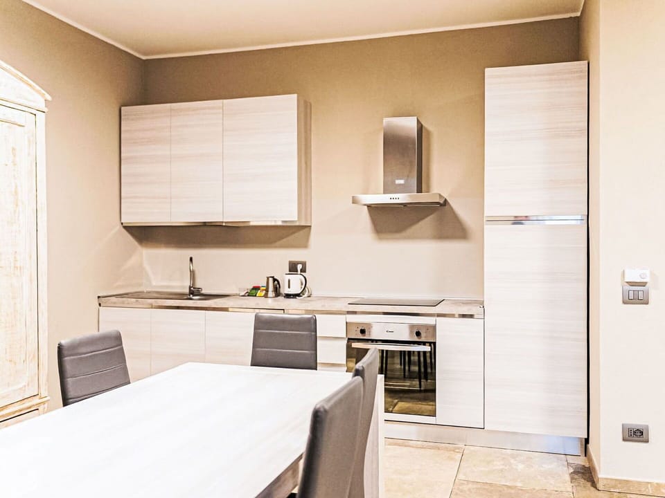 Furniture, Cabinetry, Interior Design, Wood, Flooring, Kitchen, Countertop, Home, Kitchen Appliance, Floor