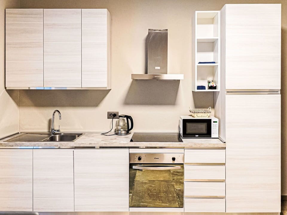 Furniture, Wood, Kitchen Appliance, Cabinetry, Kitchen, Major Appliance, Interior Design, Home Appliance, Flooring, Countertop