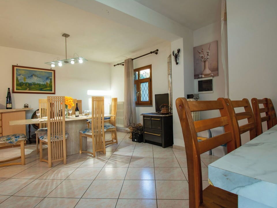 Furniture, Interior Design, Flooring, Wall, Ceiling, Floor, Wood, Room, Lighting, Chair